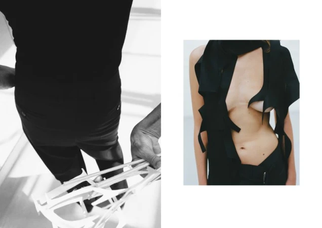 Model in black sculptural top and trousers holding white hangers for Study Magazine, photographed by Senta Simond