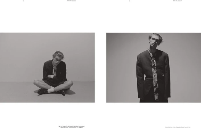 Editorial spread in black and white featuring a seated model cross-legged on the left and a standing model wearing a blazer on the right.