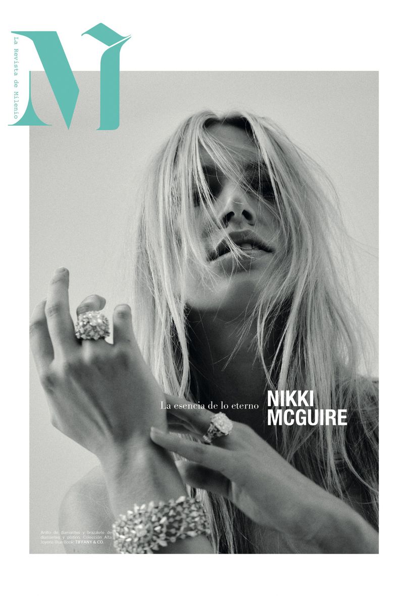 Model Nikki Mcguire wearing statement diamond rings and bracelet with hair across her face for M Revista de Milenio
