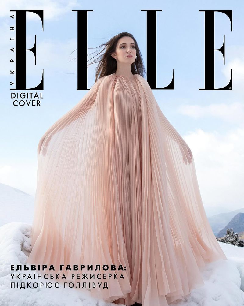 Elle magazine cover featuring Elvira Gavrilova in a pink dress on a snowy mountain, with the Elle logo and Ukrainian text.