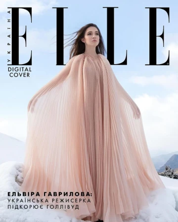 Elle magazine cover featuring Elvira Gavrilova in a pink dress on a snowy mountain, with the Elle logo and Ukrainian text.