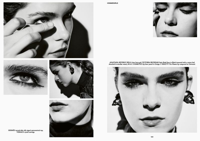 Monochrome beauty ad featuring a woman with bold eye makeup and sculptural earrings in a stark, contrasting studio setting.