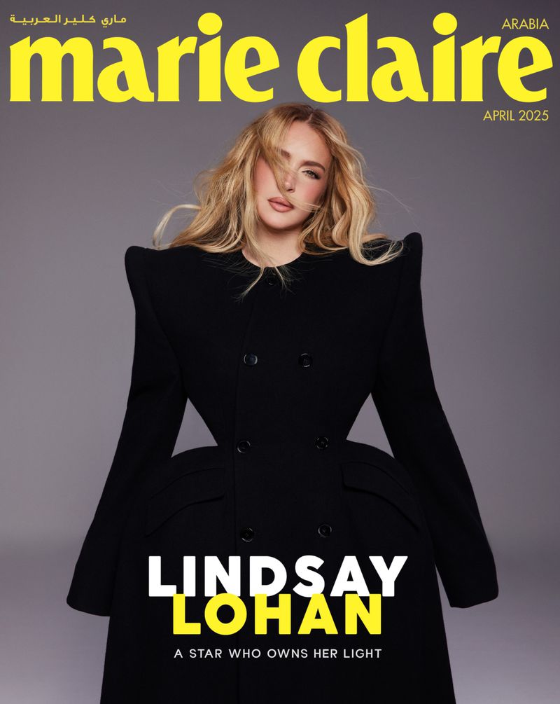 Magazine cover featuring Lindsay Lohan in a black dress, set against a grey background with 'Marie Claire' and 'April 2025' visible.