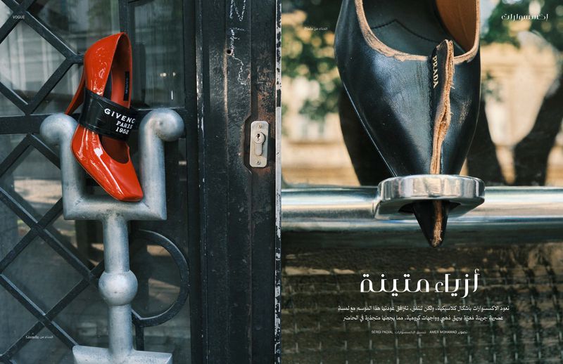 A fashion shot features a red Givenchy heel on a silver metal fence and a black Prada heel on a chrome bar, contrasting textures.