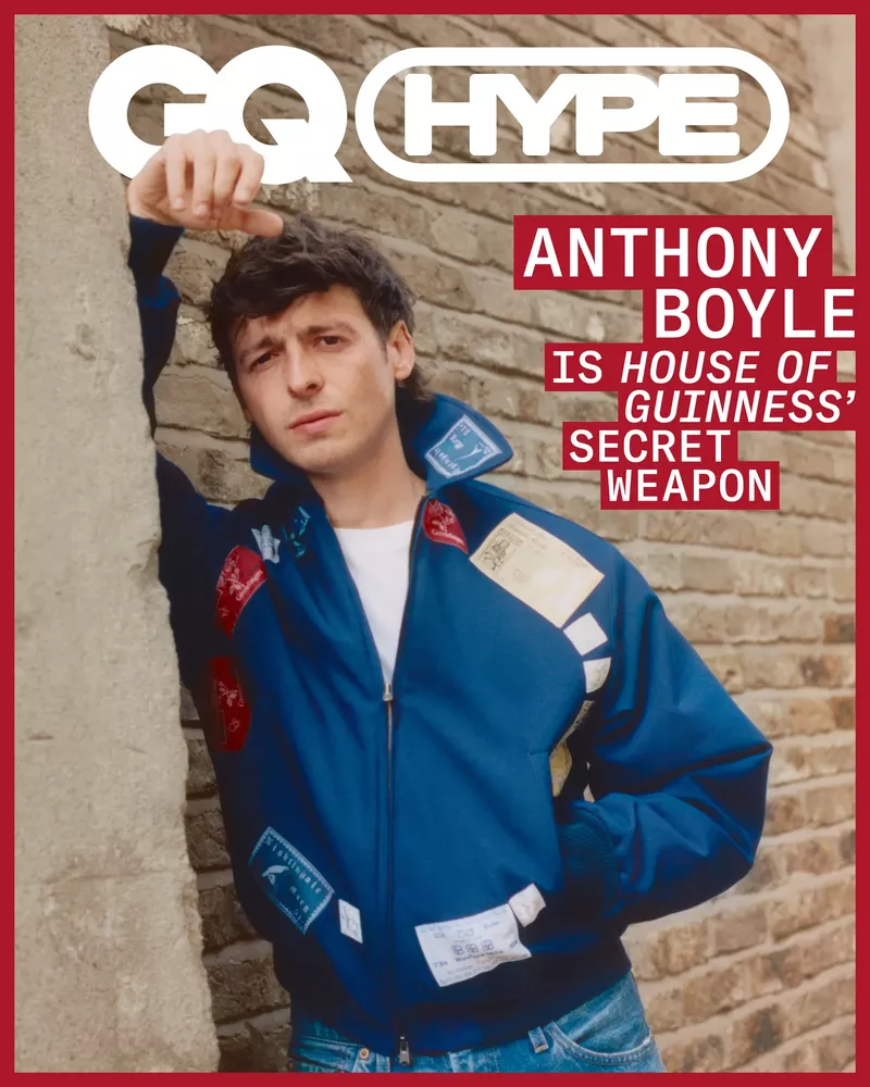 GQ Hype cover featuring Anthony Boyle in a blue jacket leaning against a brick wall, with magazine text overlay.