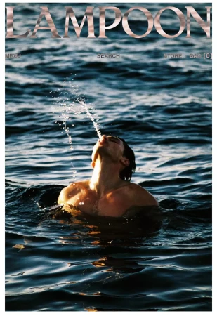 Magazine cover featuring a man in water, spouting water from his mouth, with 'LAMPOON' title, in an outdoor setting.
