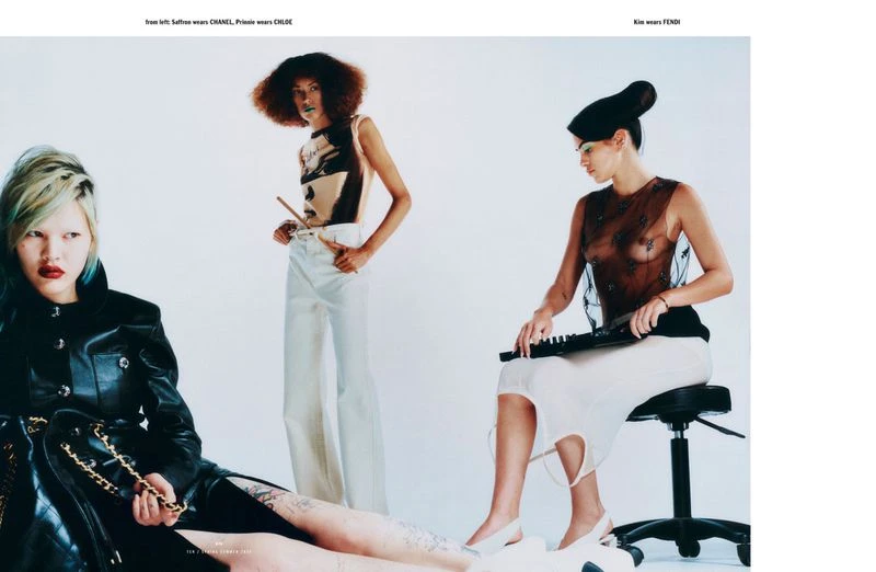 Three fashion models strike poses in a studio setting, showcasing a variety of clothing and accessories in soft, diffused lighting.