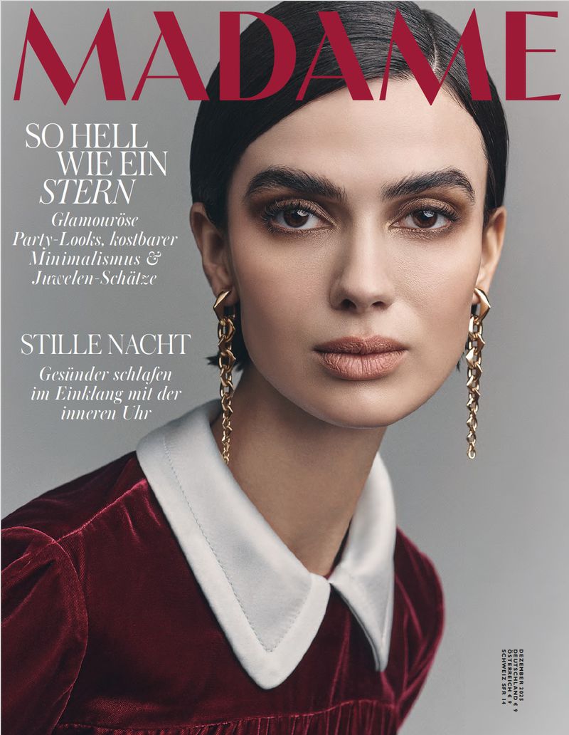 Madame magazine cover featuring a poised brunette model with gold earrings, wearing a burgundy velvet dress with a white collar.