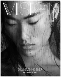 Black and white close-up portrait of an Asian male model with closed eyes draped in a sheer black textured veil.