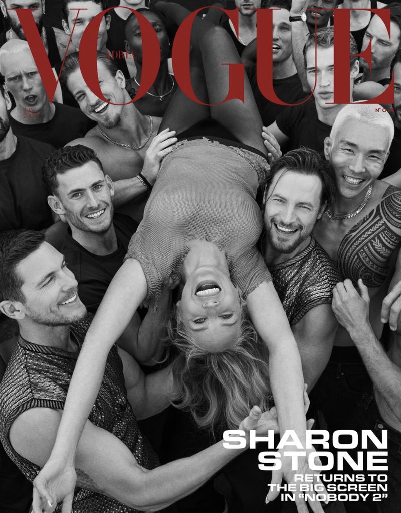Vogue cover featuring Sharon Stone held upside down by a group of smiling men, with the Vogue logo in the background.