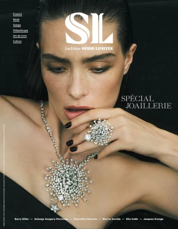 Model Jace Higgins wearing an elaborate diamond starburst necklace and matching ring on the Les Echos Série Limitée cover.