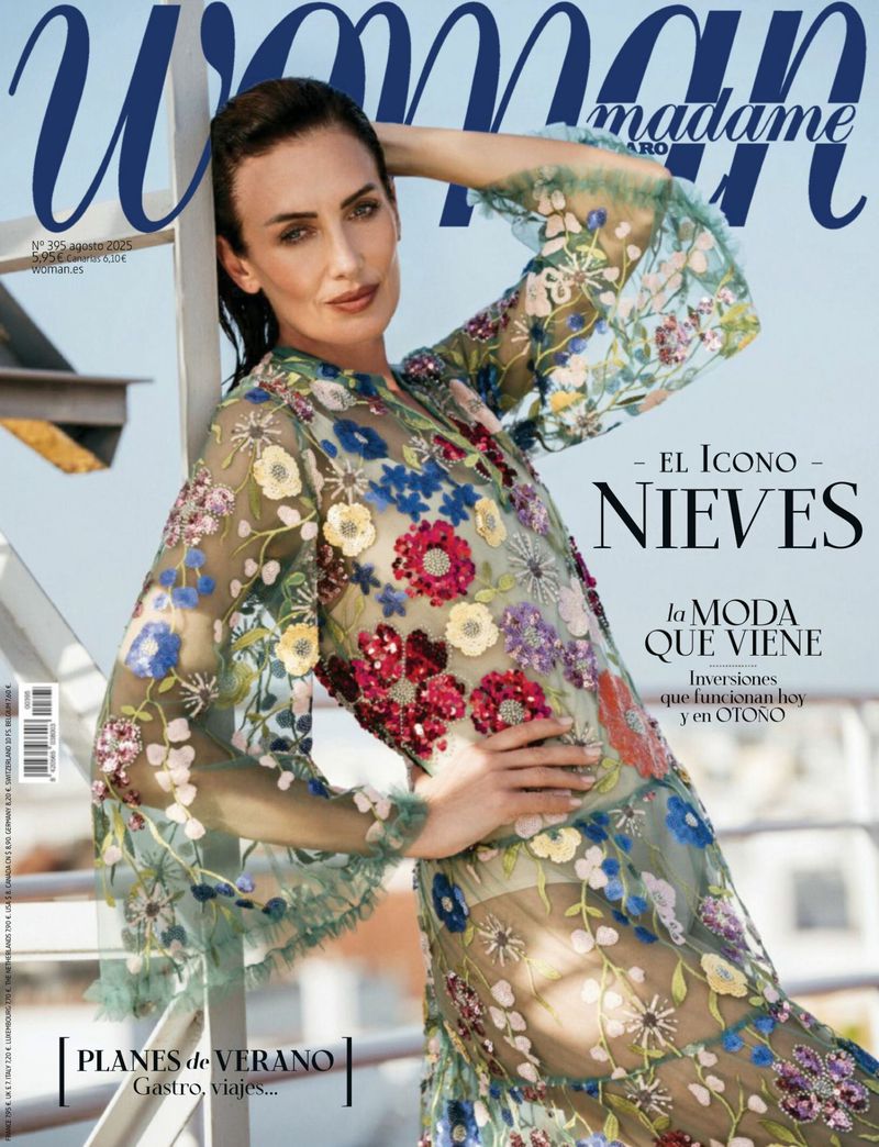 Magazine cover featuring a stylish adult female model wearing a floral dress, posing against a blurred outdoor backdrop with bright blue sky.