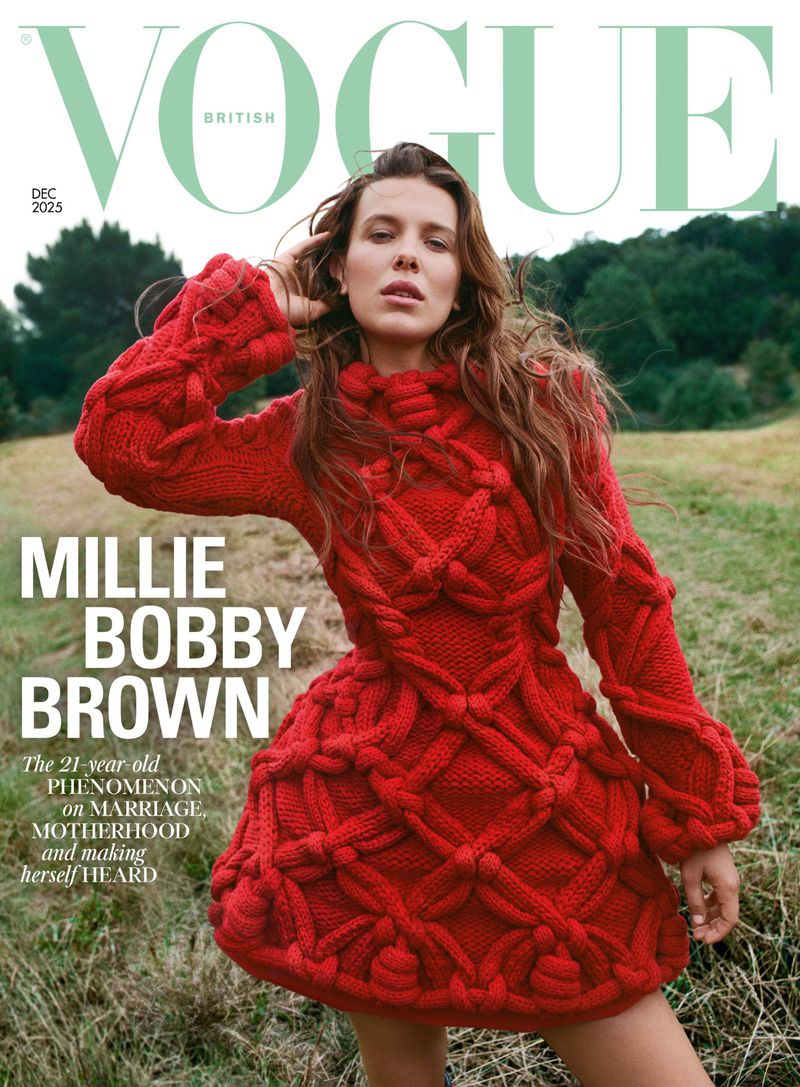British Vogue cover featuring Millie Bobby Brown in a red knit dress in a field, December 2025 issue.