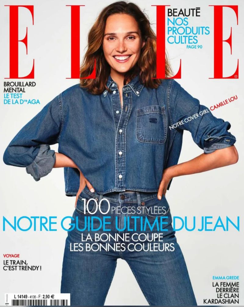 Magazine cover featuring a smiling adult female model in a denim shirt and jeans, with red 'ELLE' logo and lifestyle text.