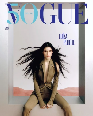 Vogue Brasil magazine cover featuring Luiza Perote in a tan suit, seated against a backdrop with neutral colors and a minimalist aesthetic.