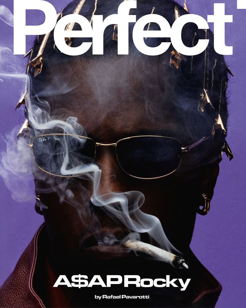 Portrait of rapper A$AP Rocky on the cover of Perfect magazine smoking a cigarette, wearing sunglasses, against a purple backdrop.