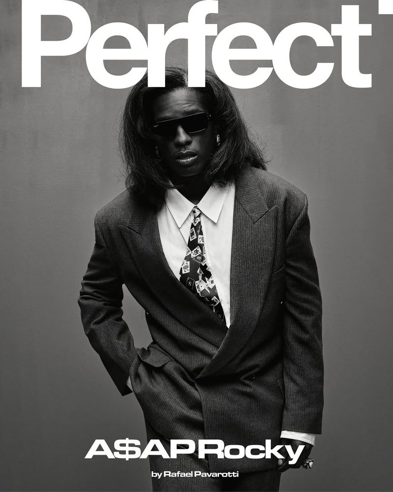 Monochrome portrait of A$AP Rocky on magazine cover wearing a suit and sunglasses against a grey background with the masthead 'Perfect'.