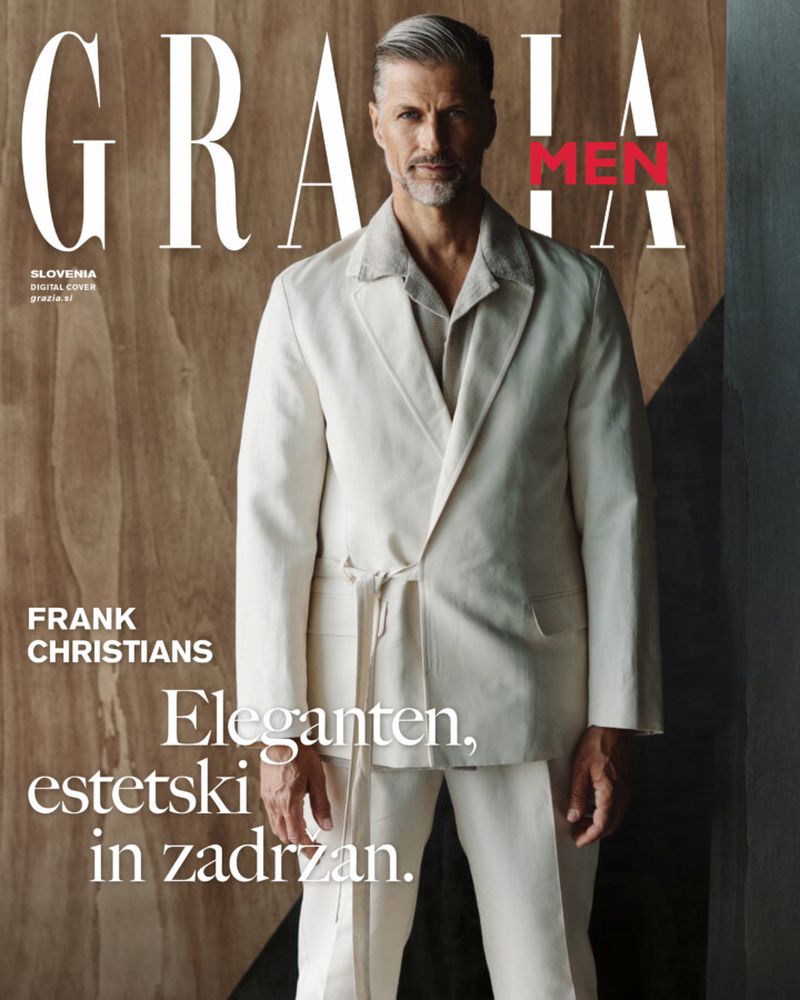 Magazine cover featuring a distinguished older male model in a cream suit against a wood-panel background, promoting GRAZIA MEN.