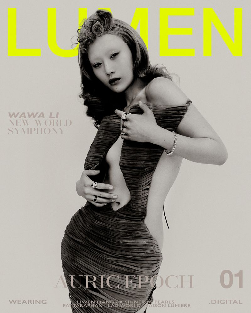Monochrome fashion magazine cover featuring an Asian woman in a dress, jewelry, and unique hairstyle, with the word LUMEN at the top.