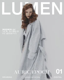 Model Wawa Li posing in an oversized textured grey trench coat with sculpted auburn hair on a Lumen magazine cover.
