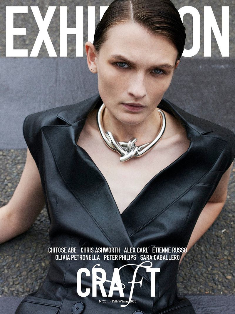Fashion magazine cover featuring a model in a black dress and silver necklace, with visible text including designer names and the word 'CRAFT'.