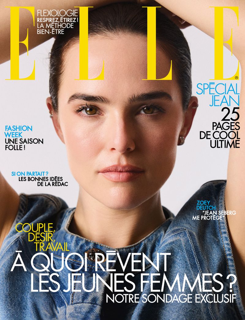 Elle magazine cover featuring a portrait of a young adult female model with brown hair and eyes, wearing a denim top and yellow masthead.