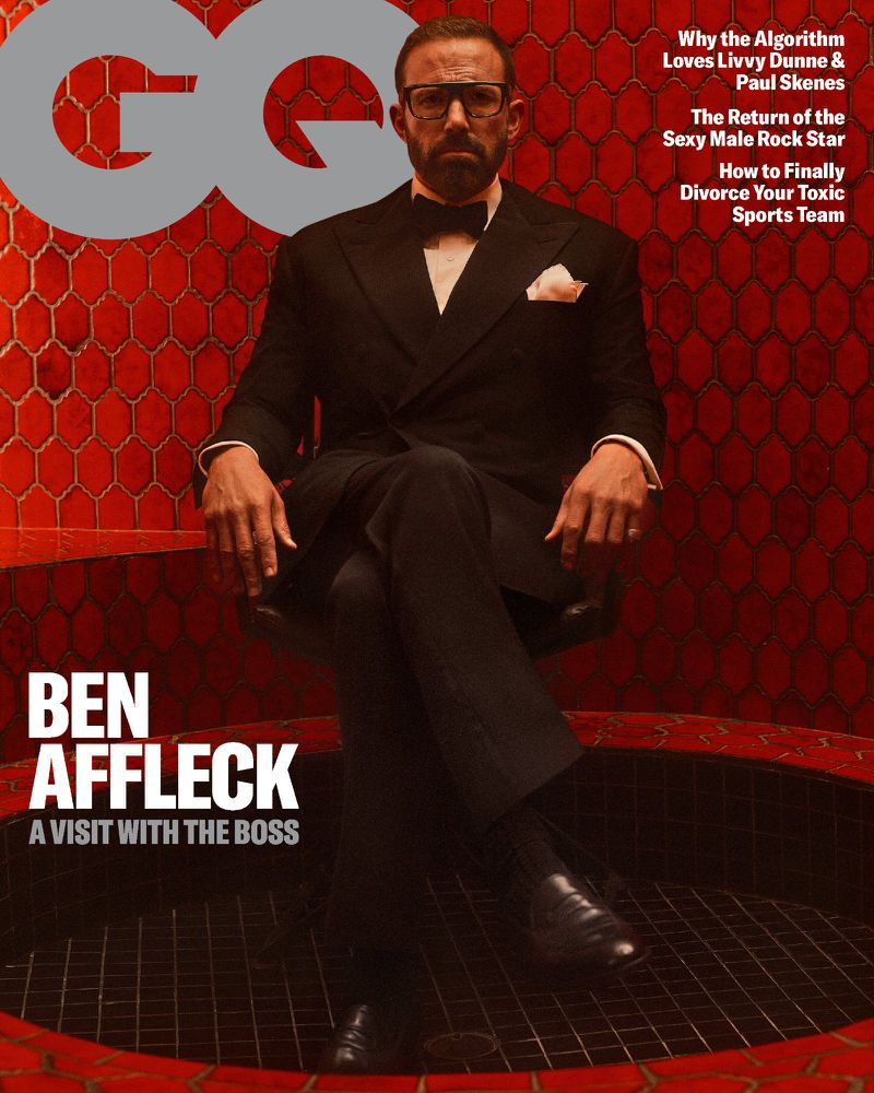 Magazine cover featuring Ben Affleck in a suit, seated against a red geometric background, with GQ logo and cover story titles.