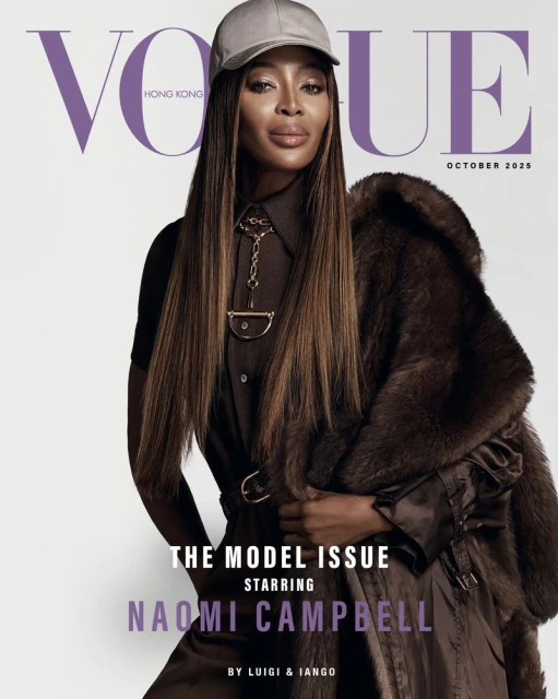 Vogue Hong Kong cover featuring Naomi Campbell in a brown outfit with a fur coat and baseball cap, set against a light grey background.