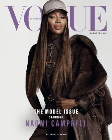 Naomi Campbell wearing a grey cap and brown coat for Vogue Hong Kong October 2025