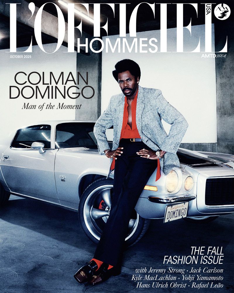 Colman Domingo magazine cover for L'Officiel Hommes, October 2025, features the actor in a red shirt and blazer leaning against a silver car.