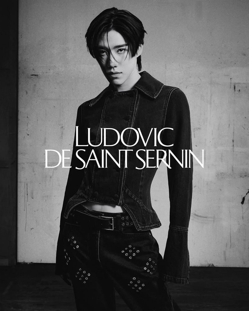 PP Krit posing in a black corseted denim jacket with flared sleeves for Ludovic de Saint Sernin Spring Summer 2026.