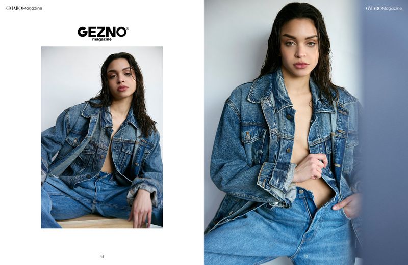 Model wearing an oversized denim jacket and blue jeans against a light background for GMARO Magazine editorial