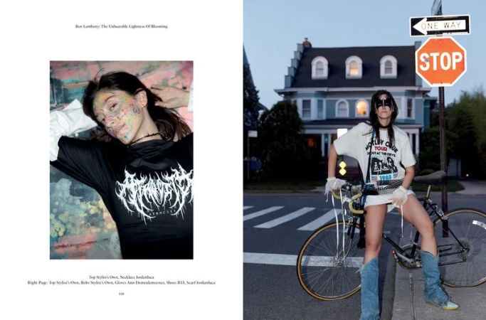 Editorial fashion shot featuring a woman with colorful makeup lying down and another standing by a bicycle next to a stop sign.