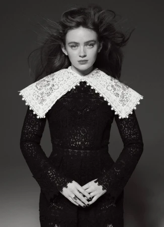 Portrait of Sadie Sink wearing a black lace dress with an ornate white collar, photographed by Philip Gay for Elle Australia.