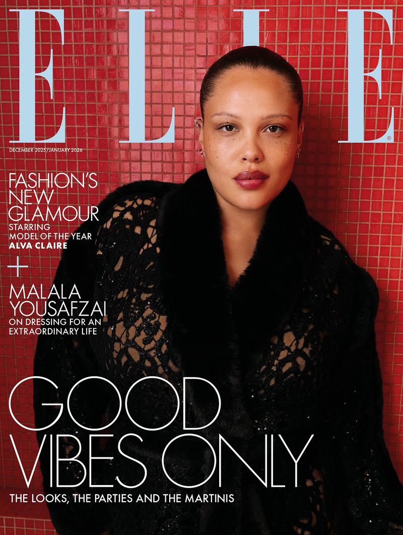 Elle magazine cover featuring model Alva Claire in a black lace top. Red tile background with white Elle logo. December 2023/January 2024.