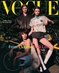 Three models posing with a yellow motorcycle for Vogue Ukraine March 2025 covers by Julia Noni.