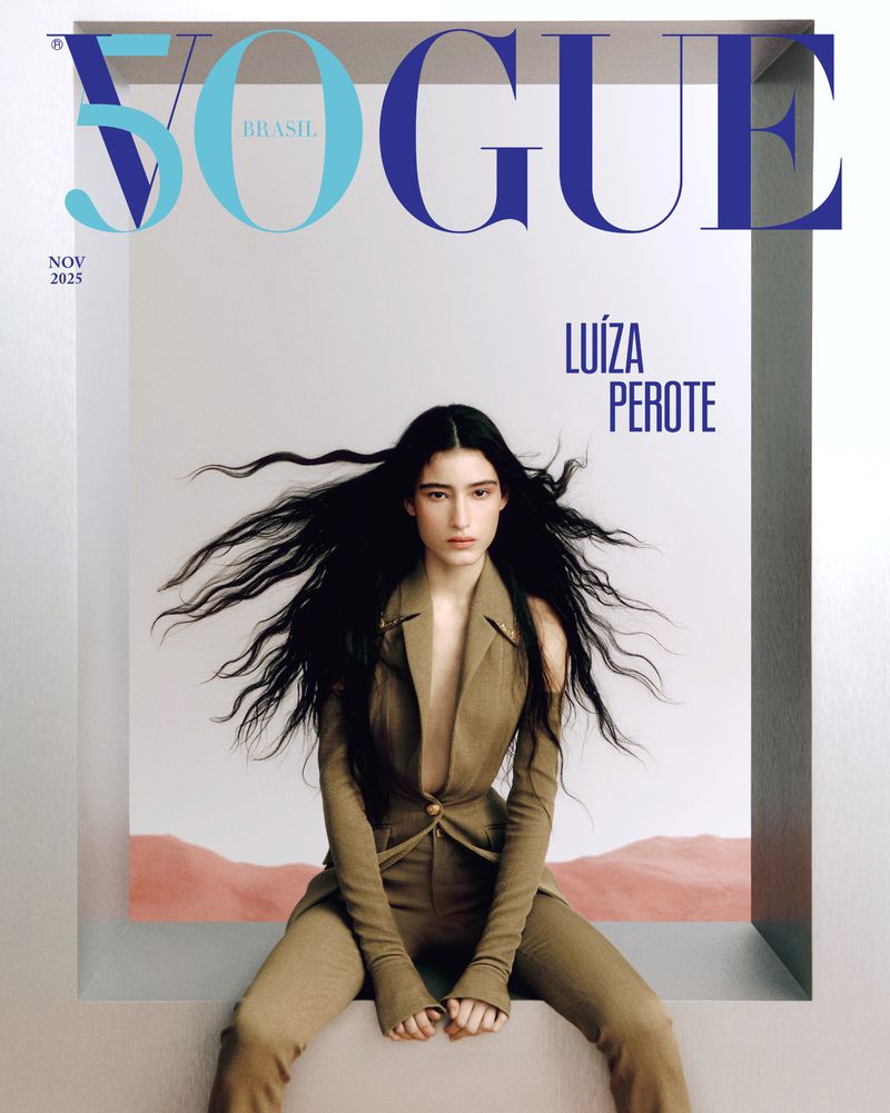 Vogue Brasil magazine cover featuring a woman with long dark hair in a beige suit, posing in a minimalist set with a muted desert background.