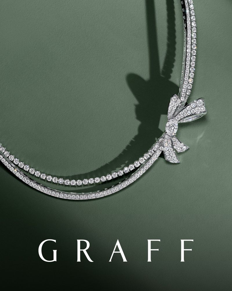 Elegant diamond Graff necklace featuring a bow design on a gradient green background, jewelry product shot, luxury fashion accessory.