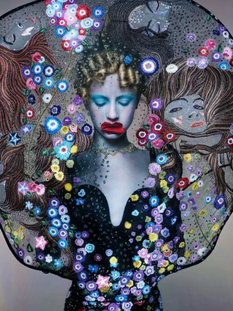 Artistic fashion portrait of a woman in a floral dress and veil, with illustrated faces in the background. Eye-level angle, studio shot.