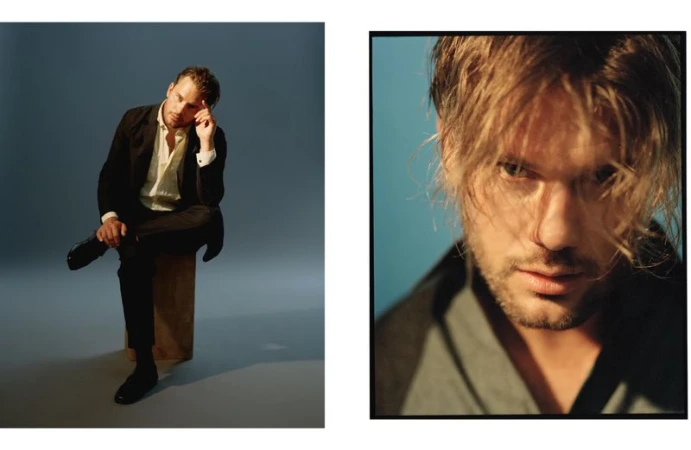 Diptych editorial photo of actor Jeremy Irvine seated in a dark suit beside a close-up portrait with warm lighting.