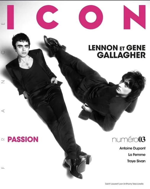 Magazine cover featuring Lennon Gallagher and Gene Gallagher in dark apparel against a bright backdrop with bold pink fonts.