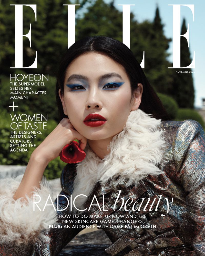Magazine cover featuring a woman with artistic makeup, wearing a fur-trimmed jacket against an outdoor backdrop with a large 'ELLE' logo.