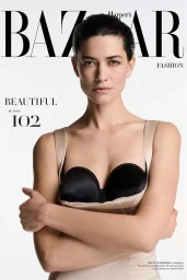 Model Louise de Chevigny wearing a beige bustier top against a white studio background for Harper's Bazaar Germany.