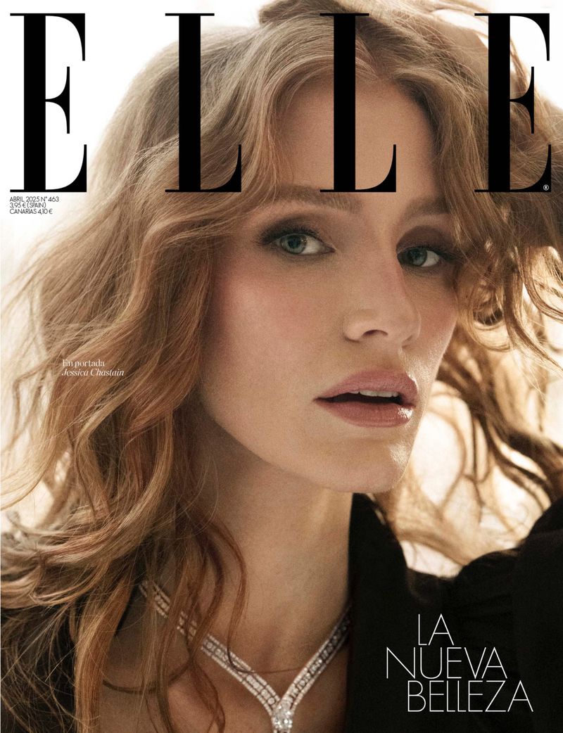 Elle Magazine cover featuring adult female with wavy auburn hair, wearing diamond necklace and black jacket against a neutral background.