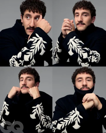 Four-panel portrait grid of Malik Elassal wearing a black jacket with white embroidered sleeves against a grey studio backdrop.