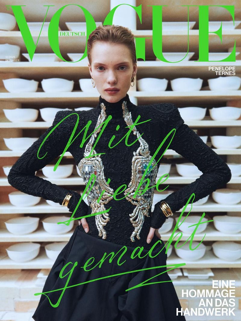 Vogue Deutsch magazine cover featuring Penelope Ternes in a black dress against a backdrop of pottery bowls on shelves.