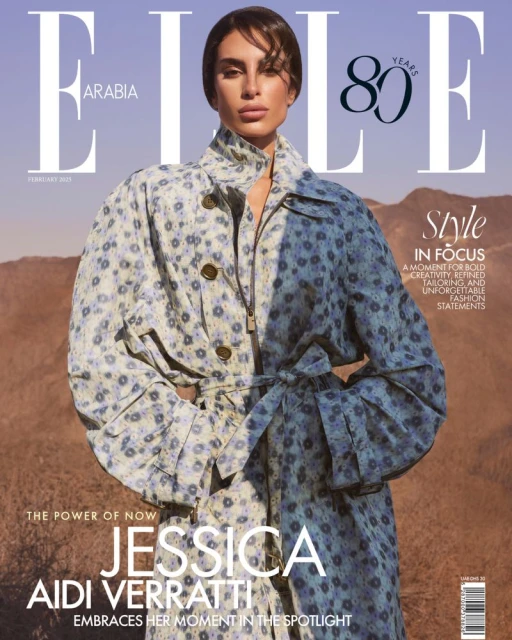 Elle Arabia cover featuring Jessica Aidi Verratti in a patterned coat, set against a desert backdrop under soft, natural lighting.