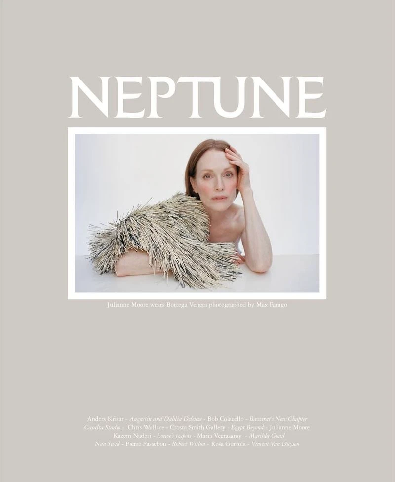 Julianne Moore posing for Neptune Papers Issue 8 cover in a textured fringed garment against a neutral background
