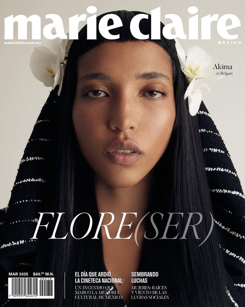 Marie Claire Mexico magazine cover featuring a close-up portrait of a woman with flowers in her hair. The cover is mostly white, black, and brown.