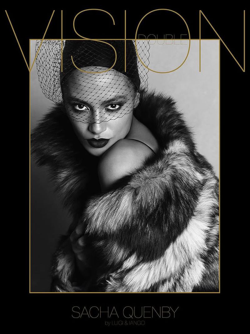 Monochrome portrait of a woman in fur coat and netting, dramatic makeup, for a fashion magazine cover with bold gold typography.